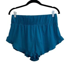 Free People movement teal blue ruffle hem athletic shorts w/ elastic waistband
